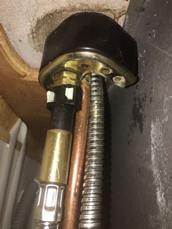 All the info i've found for such faucets shows a removable cap on top of the handle; How To Remove Moen Kitchen Faucet | MyCoffeepot.Org