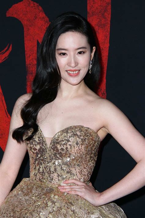 liu yifei attends the premiere of disney s mulan at dolby theatre in los angeles
