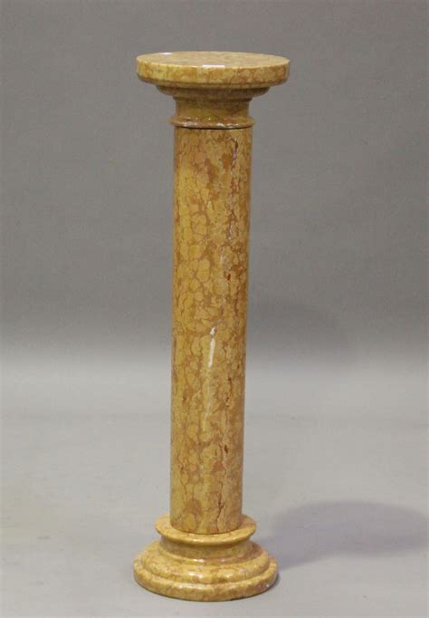 A 20th Century Pink Marble Pedestal The Square Top Above A Turned