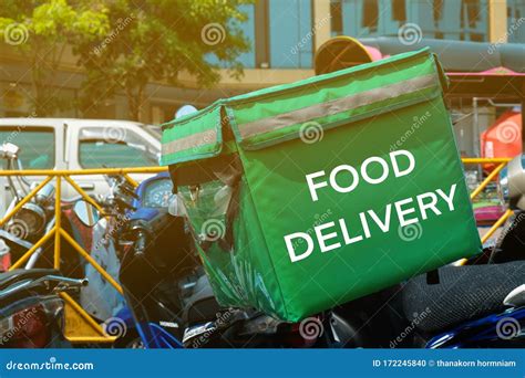 Motorcycle Food Delivery Service In The Big City Stock Photo Image Of