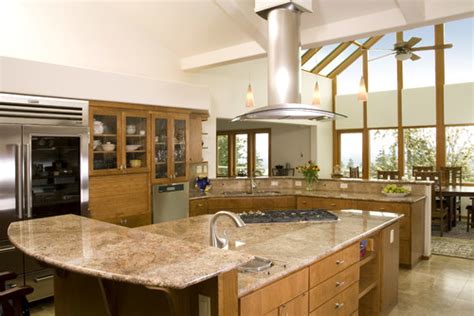 I'm sharing tips and tricks for choosing popular kitchen cabinet paint colors. Picking the Perfect Granite and Cabinet Combinations