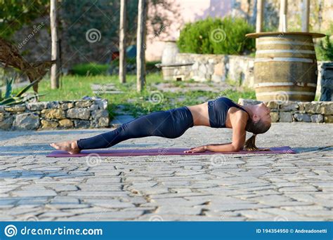 Girl Doing An Upward Plank Yoga Pose Stock Photo Image Of Healthy