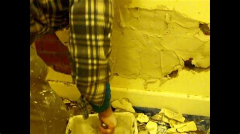 Use sharp scissors to cut a wall repair patch so that it is approximately 1 in (2.5 cm) taller and 1 in (2.5 cm) wider than the hole in the wall. Plaster repair large hole in wall - YouTube