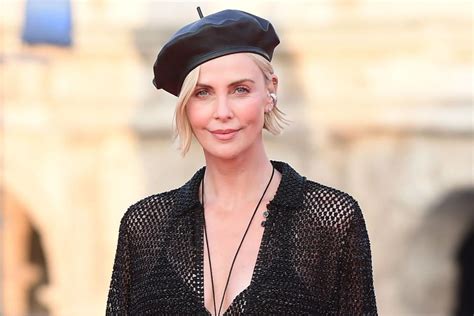 Charlize Theron Shuts Down Plastic Surgery Rumors Bitch I M Just Aging