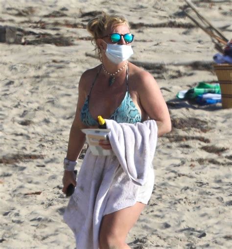 Britney Spears Sunbathing On The Beach In Malibu With Her Security Guard 40 Photos The