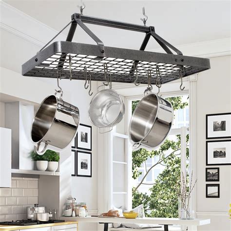 Pot rack ceiling mounts hang from the ceiling, which means that they utilize the vertical space. Enclume Hammered Steel Hanging Carnival Rectangle Ceiling ...