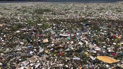 garbage waves trash covers water at beach in dominican republic