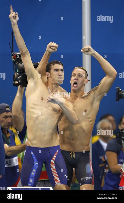 Americans Michael Phelps L And Caeleb Dressel Celebrate Winning Gold In The Mens 4 X 100m