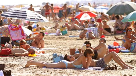 French Beaches Going PG As Women Eschew Topless Tanning Report Claims