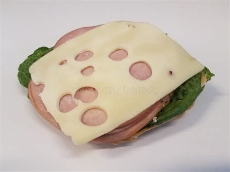 Ham And Swiss Cheese Sandwich On White Table Stock Photo Image Of