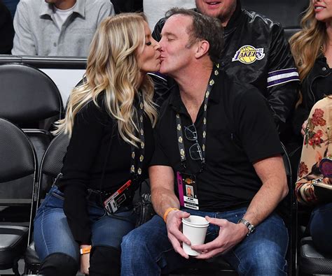 Jeanie Buss And Comedian Jay Mohr Kiss Courtside At Lakers Game