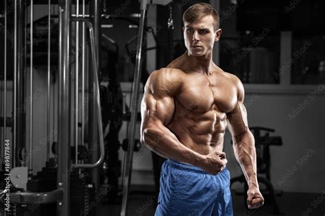 Sexy Muscular Man In Gym Strong Male Torso Abs Workout Stock Photo Adobe Stock