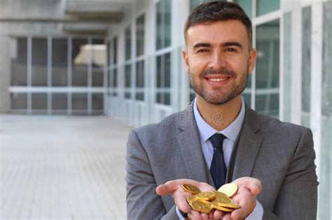 Businessman Holding Lots Of Golden Coins Stock Photo Image Of Fortune