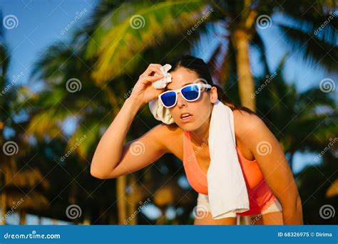 tired fitness woman sweating after summer workout stock image image of motivated sunset 68326975