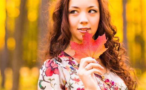 Young Woman With Autumn Leaves In Hand Stock Photo Image Of Female