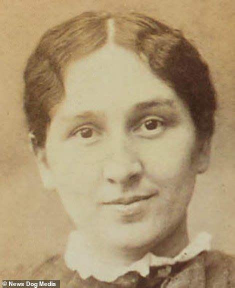 An Old Black And White Photo Of A Woman