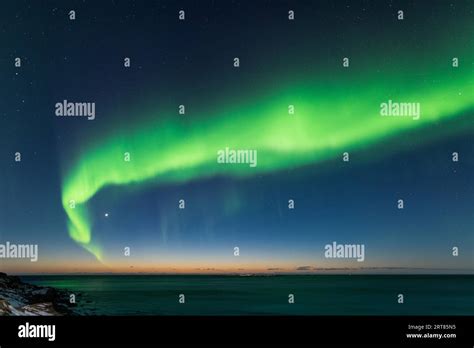 Spectacular Dancing Green Strong Northern Lights Over The Famous Round