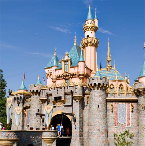 How Sleeping Beautys Disneyland Castle Transforms For The Holidays
