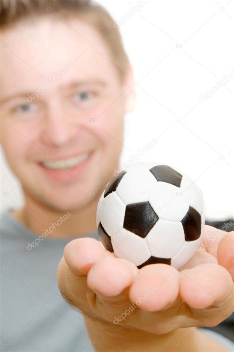 Soccer Player Holding A Small Ball — Stock Photo © Jamessmirnoff 1304004