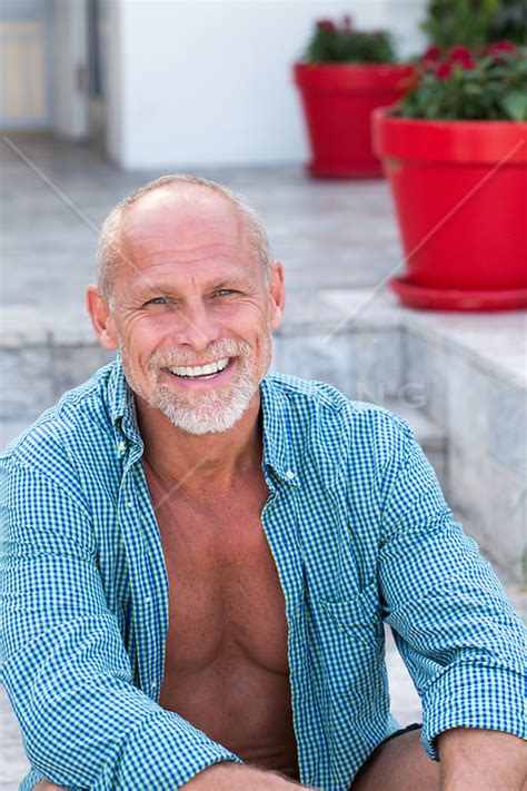 Handsome Bald Middle Aged Man With Blue Eyes Rob Lang Images Licensing And Commissions