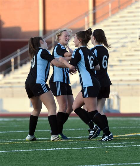 Girls From The Sme Varsity Soccer Team Celebrate After They Score