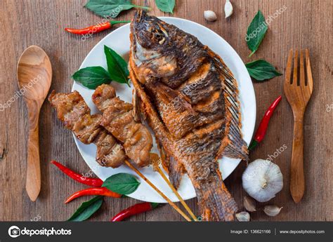 Delicious Food With Fish Fried And Roasted Pork — Stock Photo