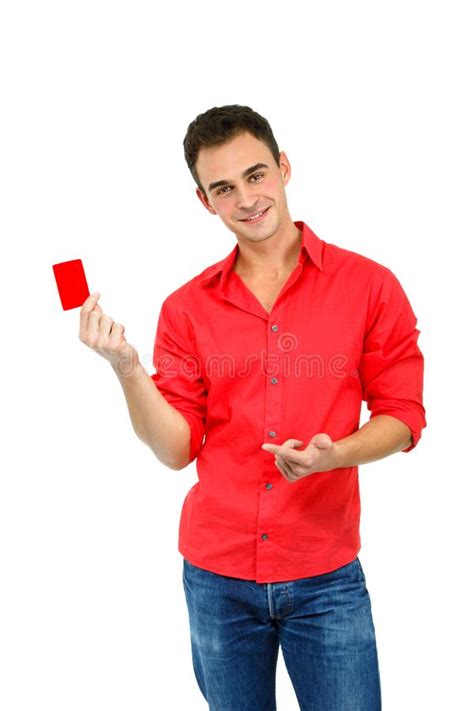 Attractive Friendly Smiling Confident Young Man Showing Red Card Stock