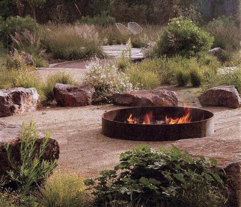 Remove the cap from a bottle of bourbon. 35 Metal Fire Pit Designs and Outdoor Setting Ideas