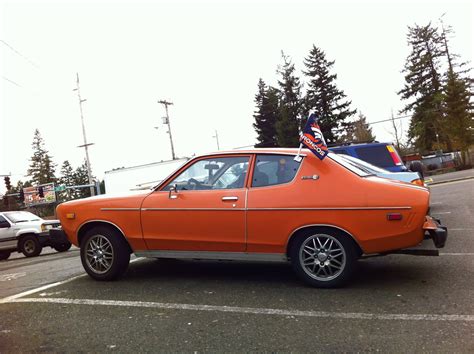 Old Parked Cars 1977 Datsun B210