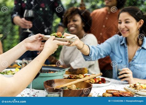Group Of Diverse Friends Enjoying Summer Party Together Stock Photo