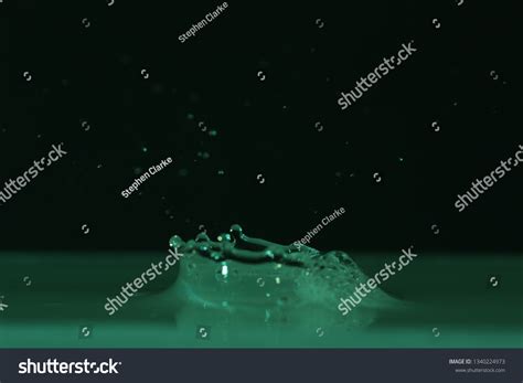 Water Drop Hitting Water Splash Art Stock Photo 1340224973 Shutterstock