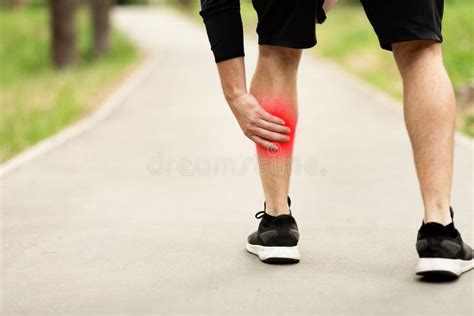 Calf Leg Pain Man Holding Sore And Painful Muscle Stock Photo Image