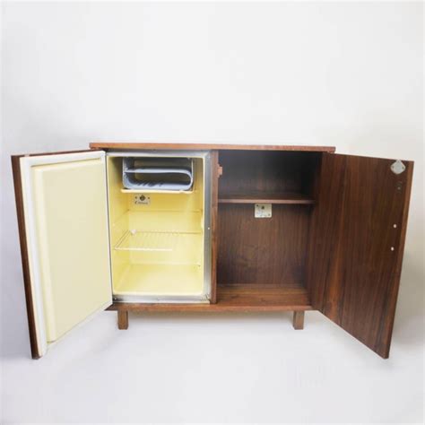 What kind of bar cabinet with wine rack? Vintage 1960's Mid-Century Modern Walnut Mini Bar Fridge ...