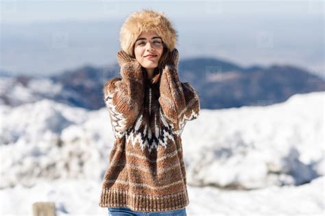 Young Woman Enjoying The Snowy Mountains In Winter 191385