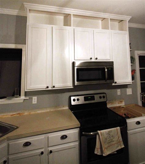 There are actuallt two different stock size upper cabinets you can purchase. How to extend kitchen cabinets to the ceiling • Charleston Crafted