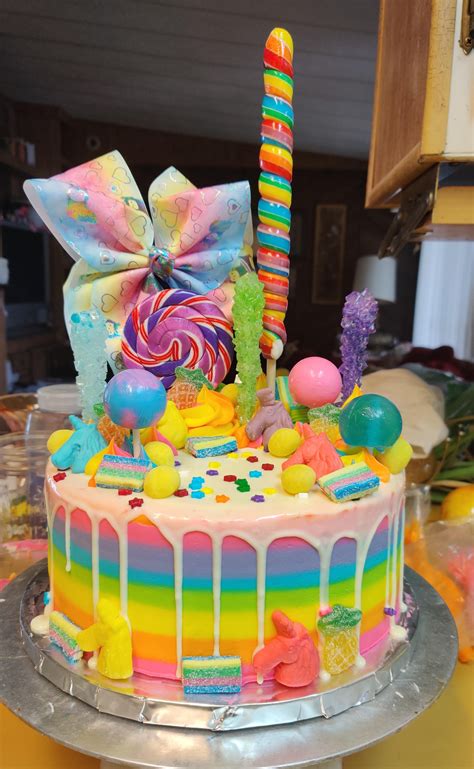 Rainbow Unicorn cake for my brother's fiancee's birthday. Lemon cake with blueberry filling and ...