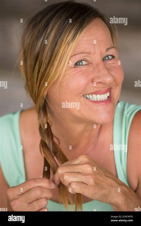 Portrait Fit Attractive Mature Woman Braiding Her Hair Happy Smiling Relaxed Confident