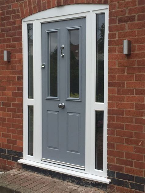 High quality finished interior doors. Moondust grey composite door in a white upvc frame ...