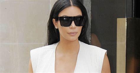 Kim Kardashian Wears A Super Low Cut White Top In Paris Huffpost
