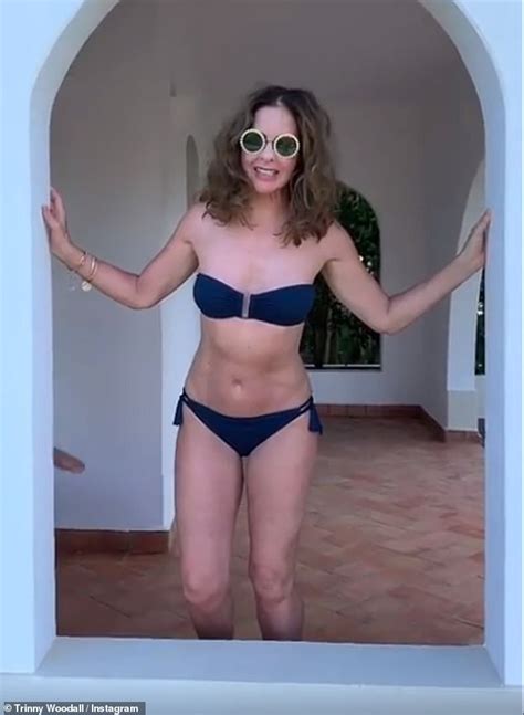 Trinny Woodall 55 Flaunts Her Taut Abs In A Tiny Navy Strapless Bikini Daily Mail Online
