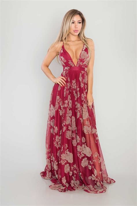 A Sleeveless Mesh Maxi Dress In A Velvet Floral Print With A V Shaped Neckline Cross Back