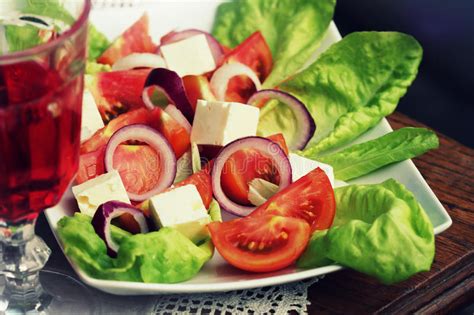 Salad With Lettuce Goat Cheese And Tomato Stock Photo Image Of