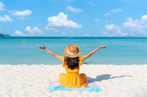 Female Relaxing At Tropical Sandy Beach With Beautiful Blue Sky Summer Vacation Concept Stock