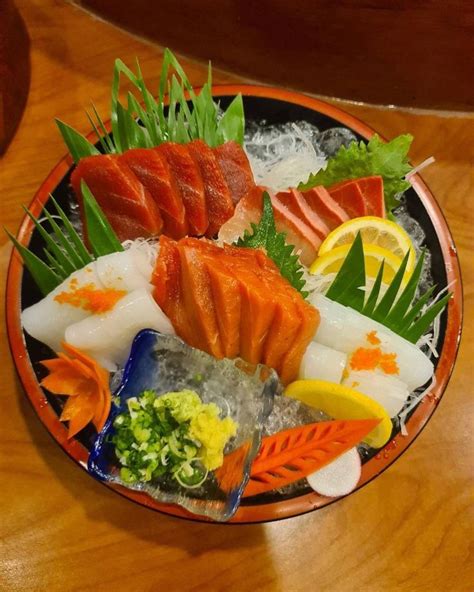 A Bowl Filled With Different Types Of Sushi