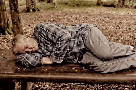 Man Sleeping On A Park Bench Free Image Download