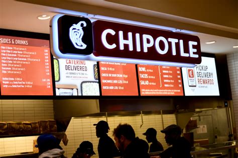 Chipotle raises menu prices as employee costs increase | Reuters