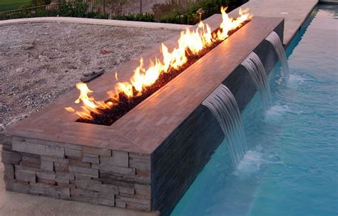 The weather is beautiful this time of year and it's time to head outside and hang out! Fire and water fountain | Beautiful Fountains | Pinterest