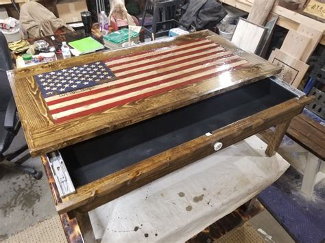 We posted something a while back on this cassette tape coffee table by jeff skierka. Flag concealment coffee table with magnetic lock | Pallet ...