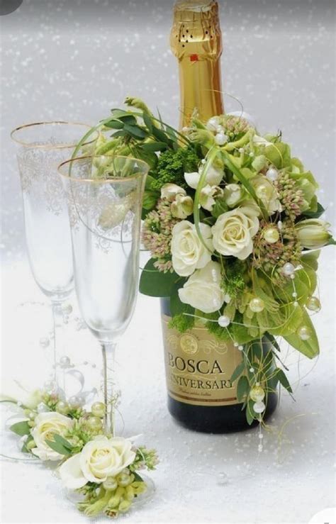 Floral Arrangement In Wine Bottle For Mother’s Day Hilda´s Flowers Collection