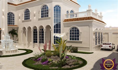 Glazed panels open entirely, revealing a kitchen that doubles as a games room, reading room or office. Garden design